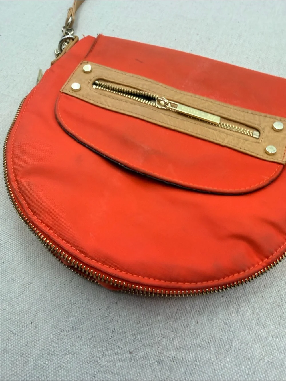 Compact Orange Crossbody with Tan Trim and Gold Hardware